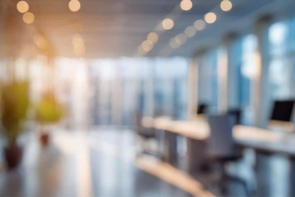 Blurred office interior space background. Working space with defocused effect. Business concept